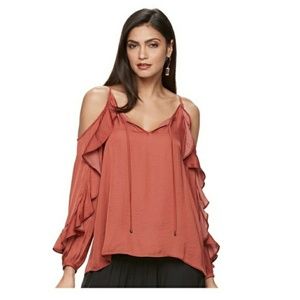 Jennifer Lopez light blue cold shoulder top